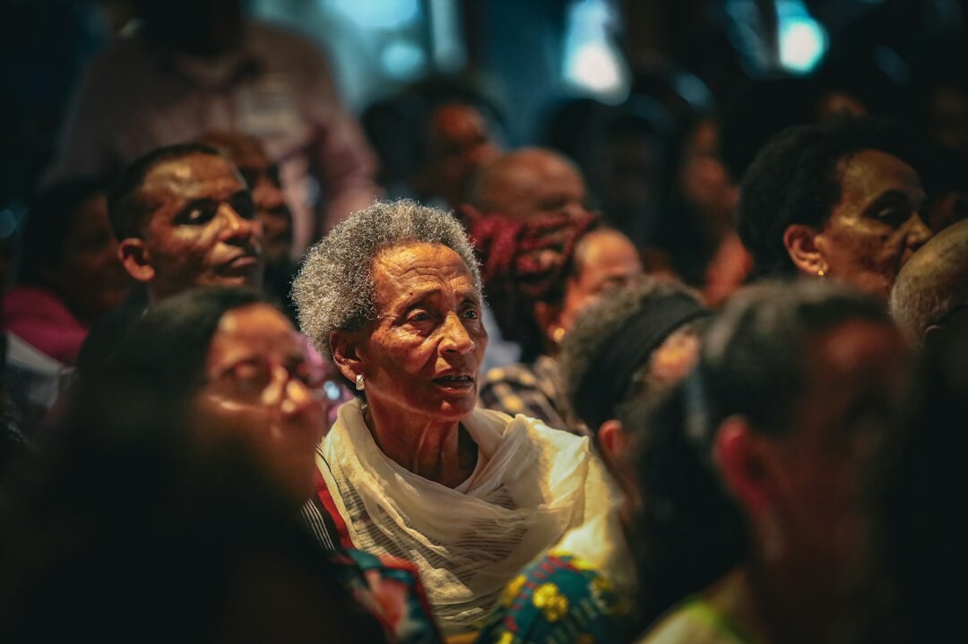 crowd of people with worried expressions