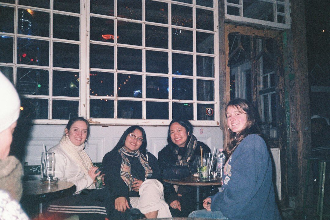 Small group discussion around a table