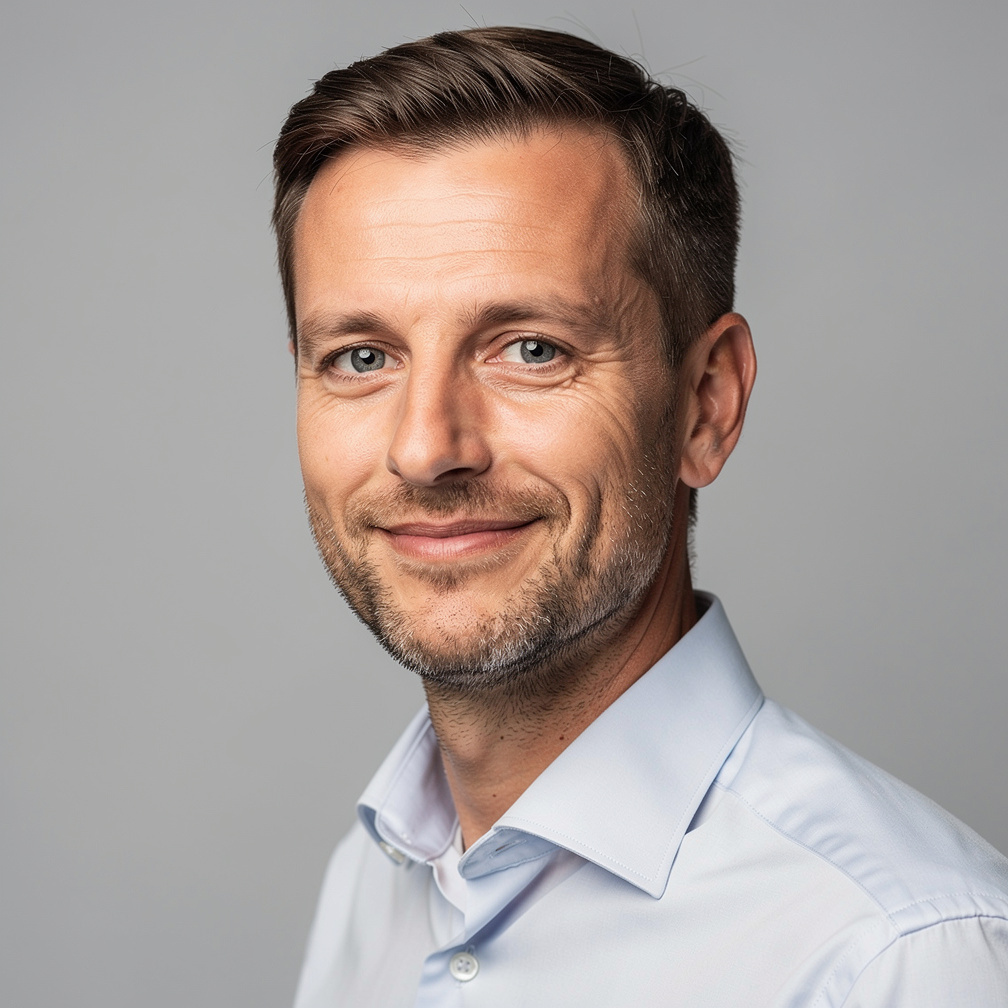 Studio portrait of a German male researcher